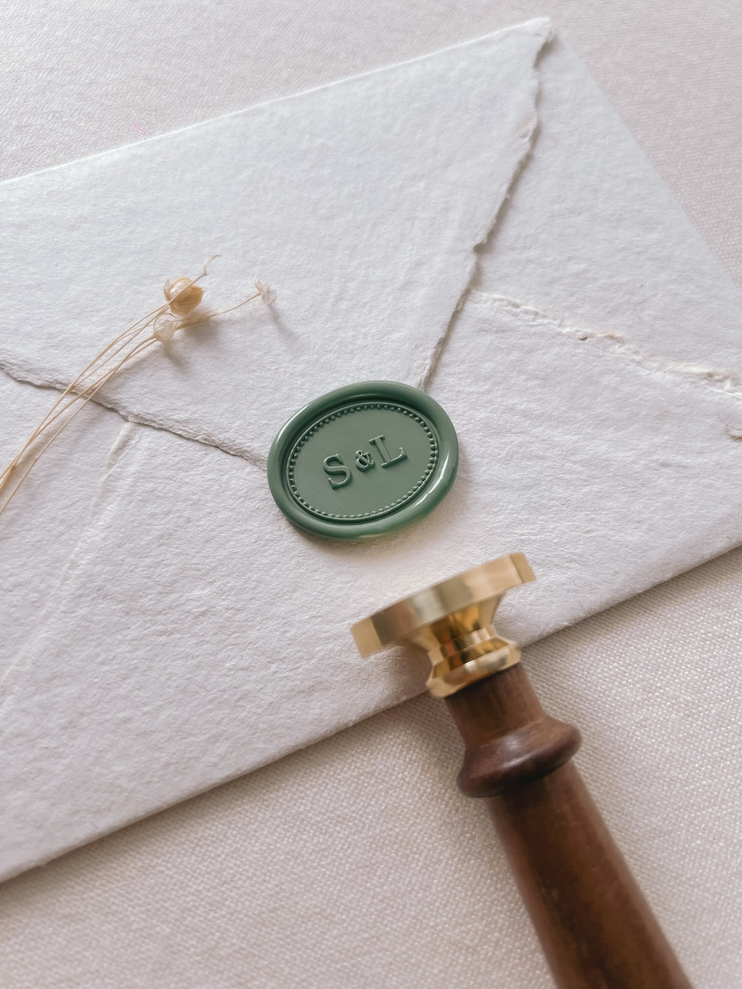 horizontal oval custom initials green wax seal