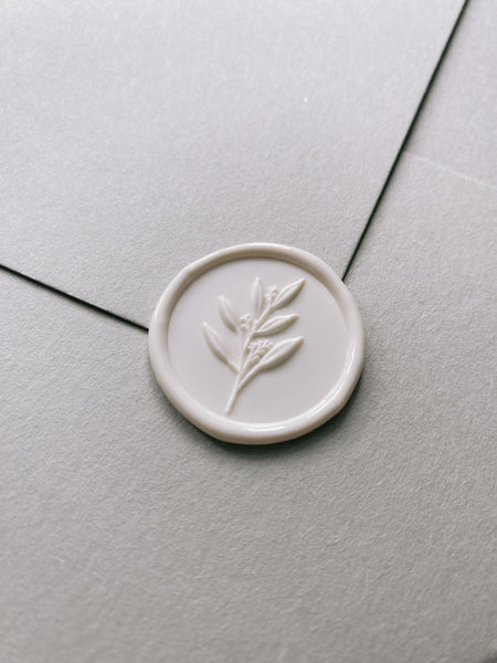 3D Leaf Branch Wax Seal in off white on beige paper envelope