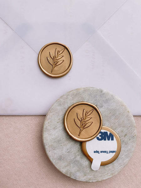 Leaf branch wax seals in gold with 3m sticker on small gray stone dish