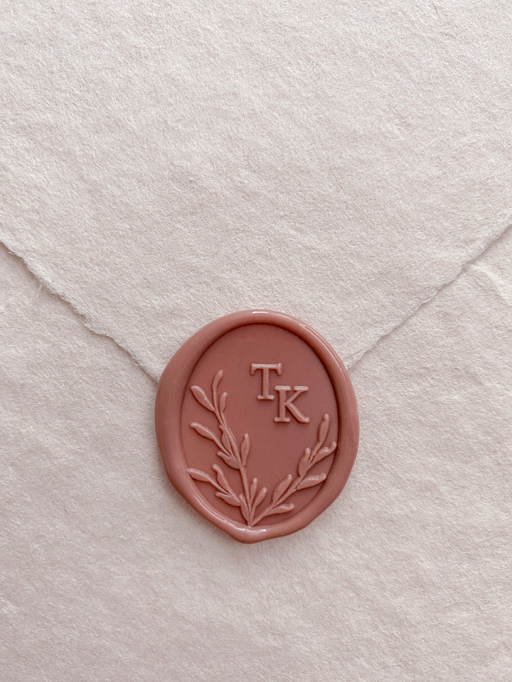 Oval leaves wreath monogram dusty rose custom wax seal on beige handmade paper envelope