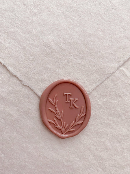 Oval leaves wreath monogram dusty rose custom wax seal on beige handmade paper envelope