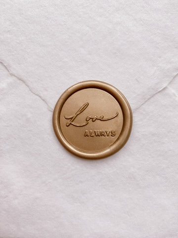 Gold Love Always wax seal on white handmade paper envelope