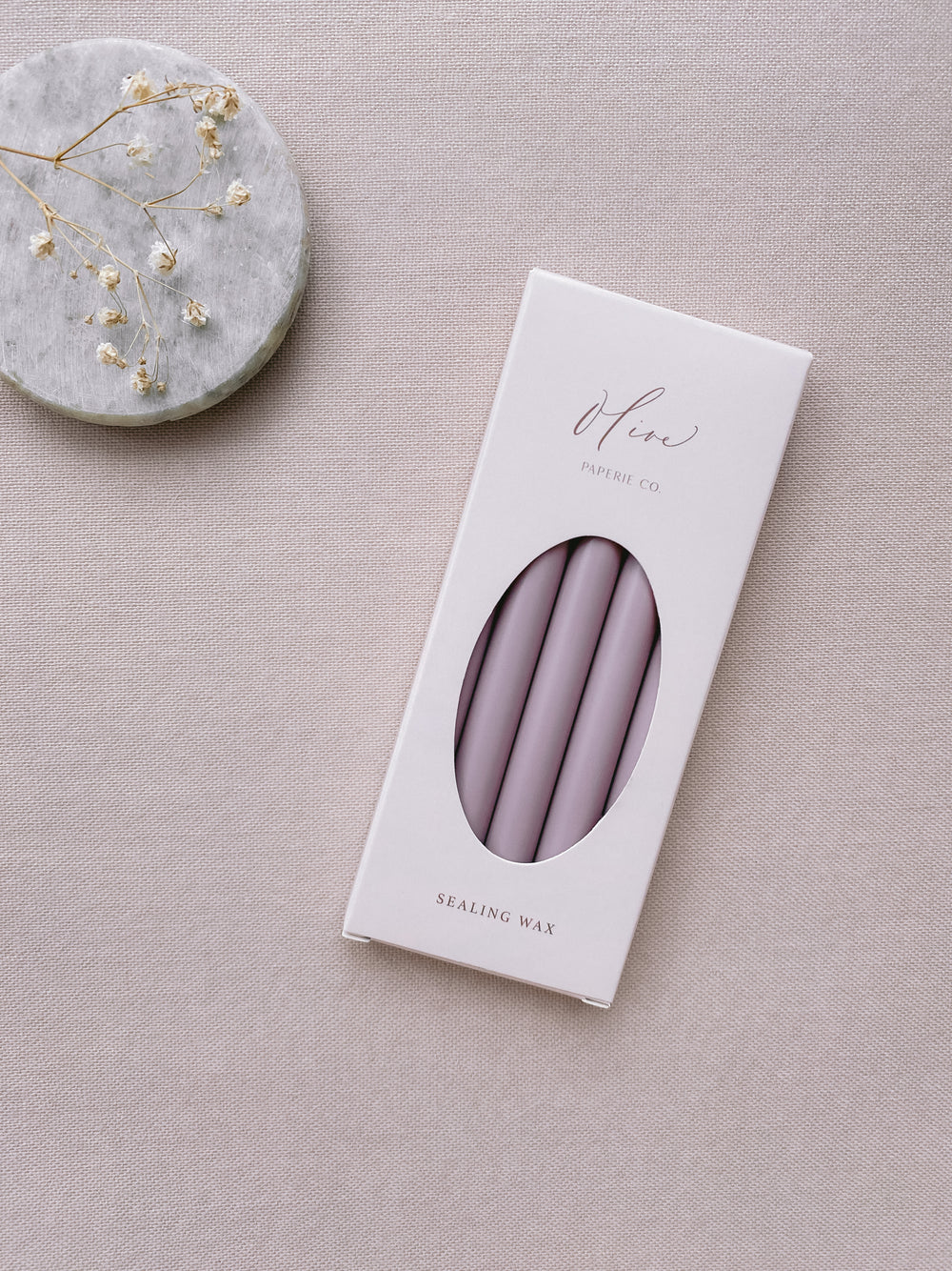 a box of 5 mauve sealing wax sticks_side angle