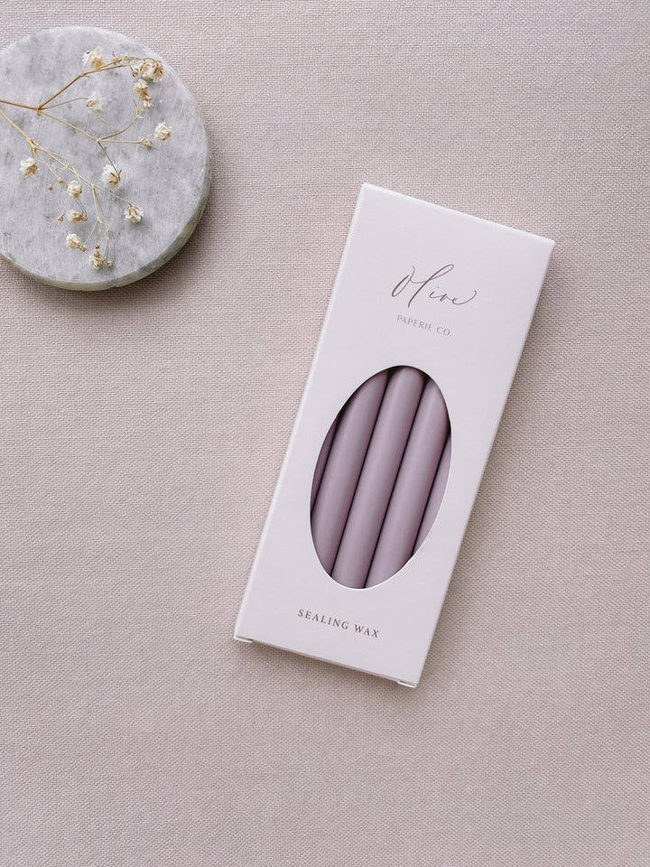 a box of 5 mauve sealing wax sticks_side angle