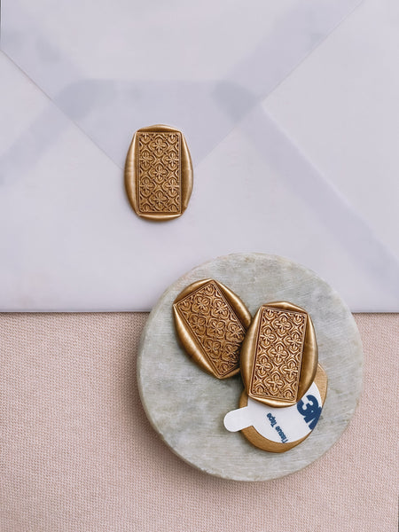 Talavera tile pattern gold rectangular wax seal on vellum envelope