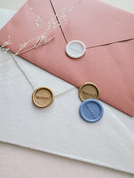 Mini merci wax seals in color gold, French blue and off-white