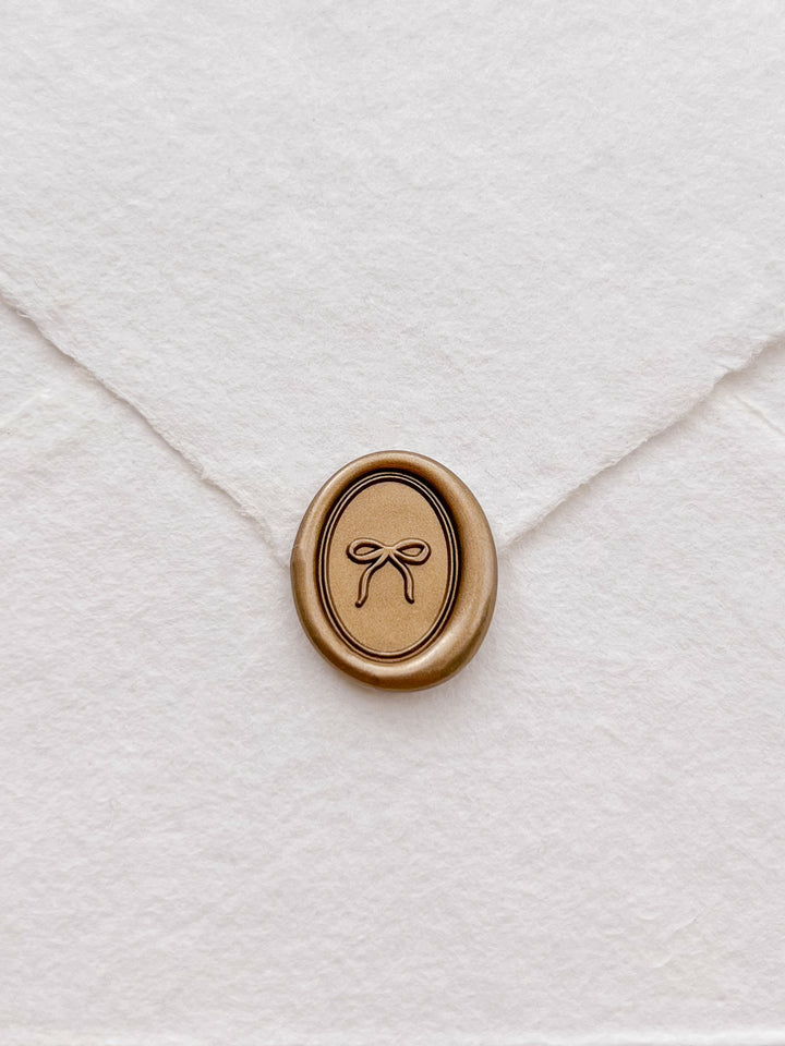 hand-drawn bow mini oval gold wax seal