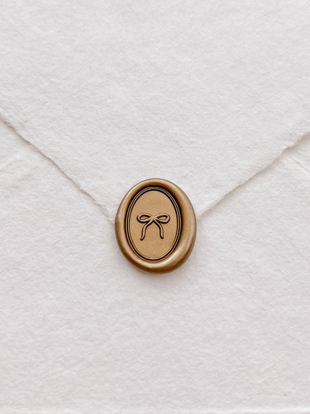 hand-drawn bow mini oval gold wax seal