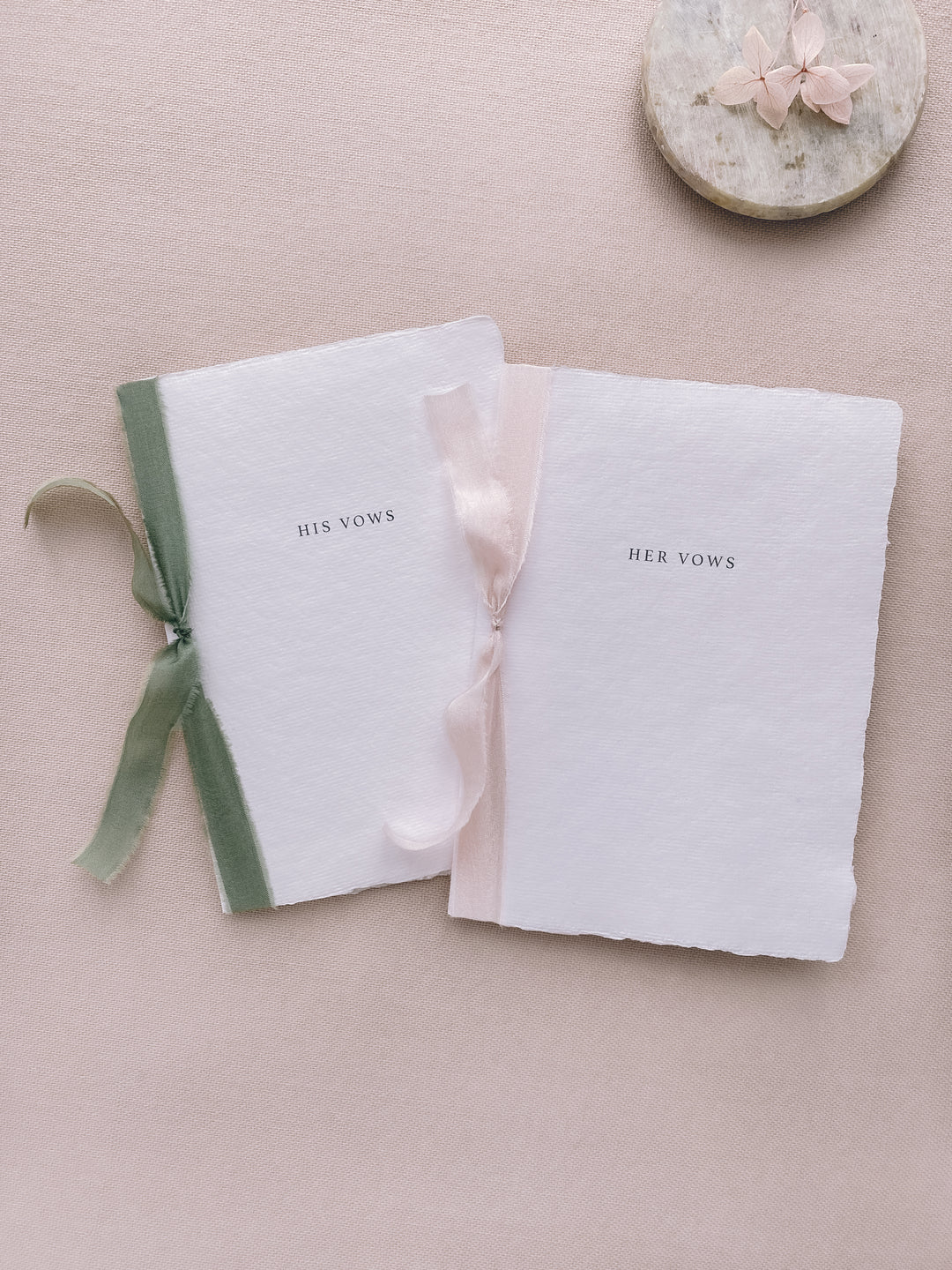 simple his vows and her vows white handmade paper wedding vow books tied in green and pink silk ribbons