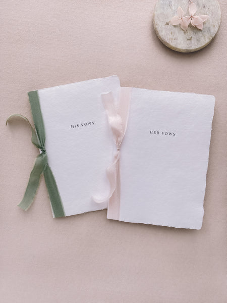 simple his vows and her vows white handmade paper wedding vow books tied in green and pink silk ribbons