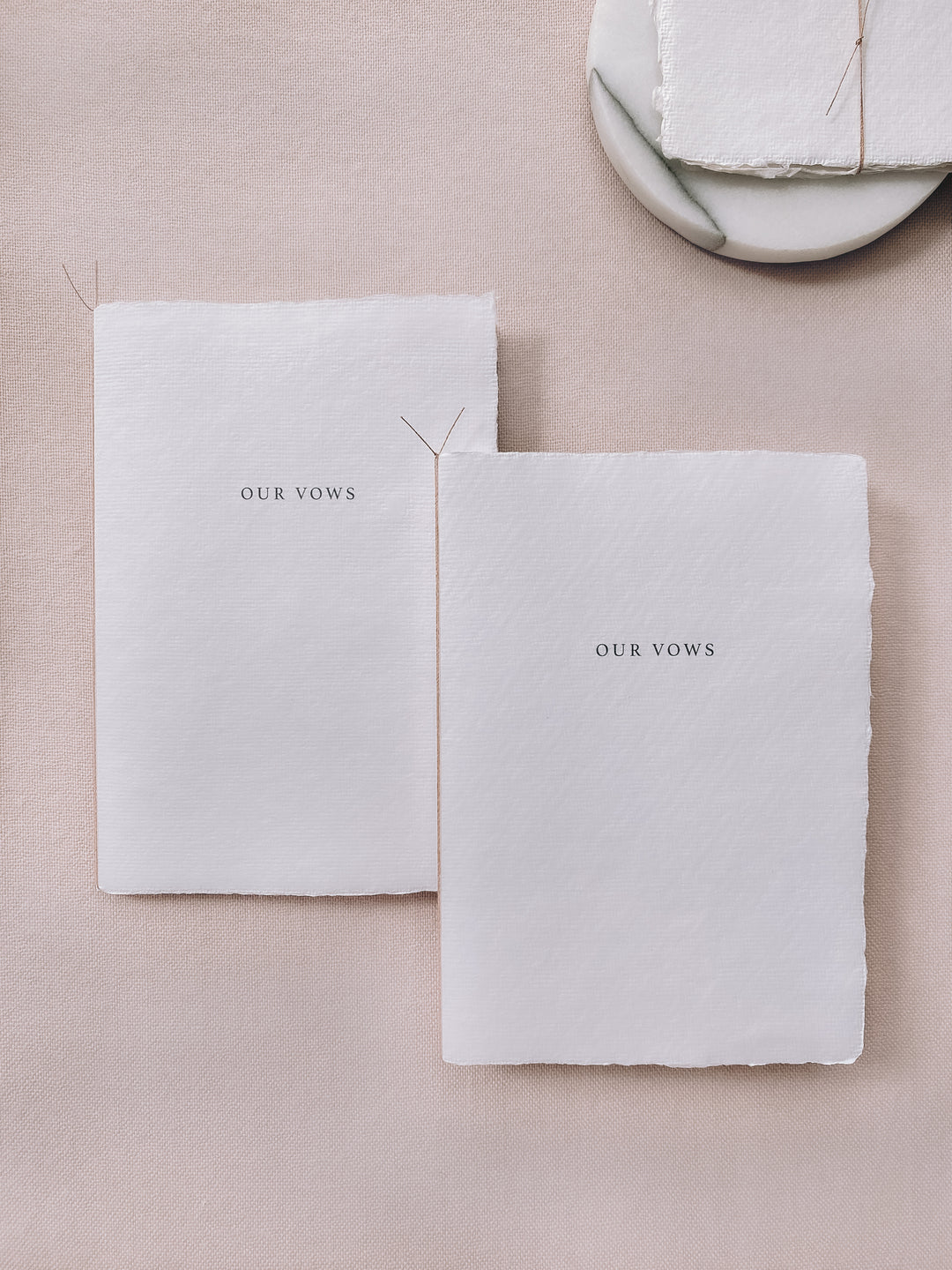 Our vows white deckled edge paper vow books tied in brown twine