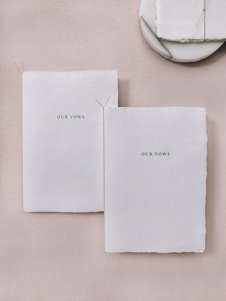 Our vows white deckled edge paper vow books tied in brown twine