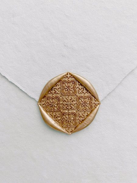 Nora moroccan tile wax seal in gold on handmade paper envelope