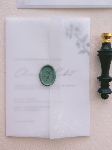 leaf design oval arch shaped green wax seal on a vellum jacket