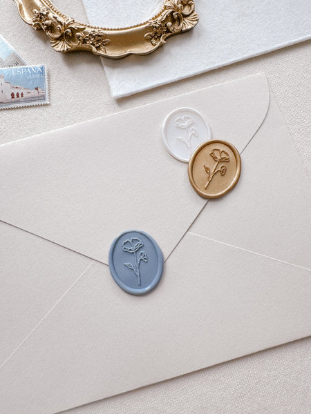 Oval flower wax seals in various colors dusty blue, white pearl and light gold