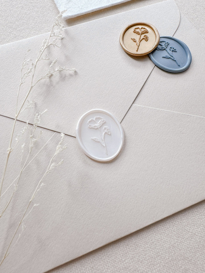 Oval flower wax seals in various colors, white pearl, dusty blue and light gold