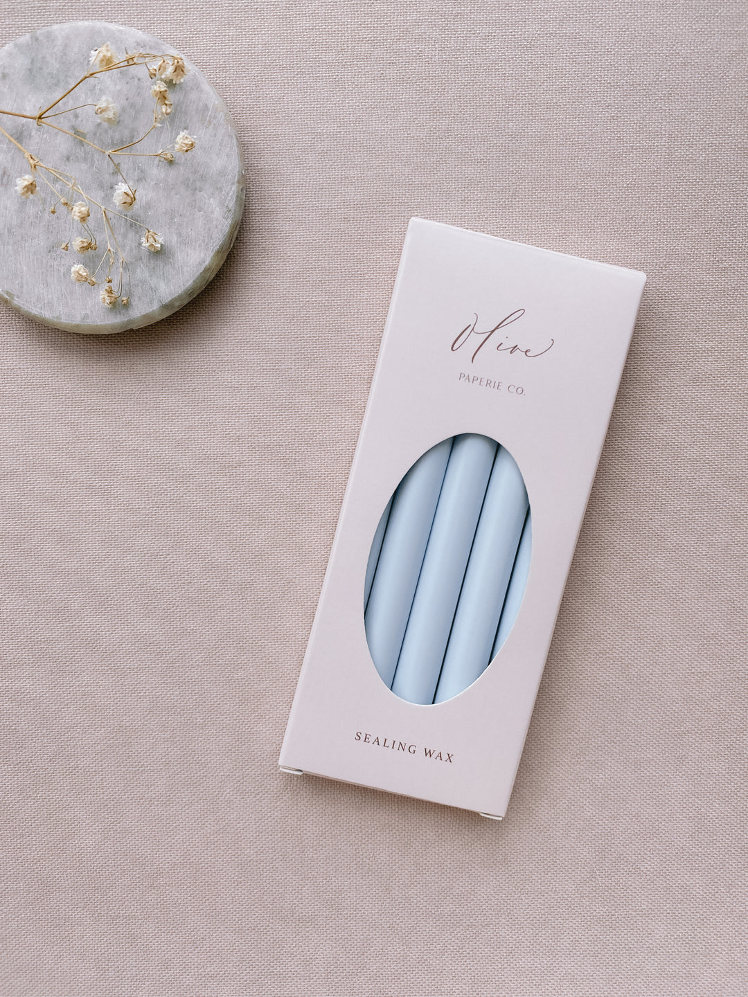 a box of 5 pale blue sealing wax sticks_side angle