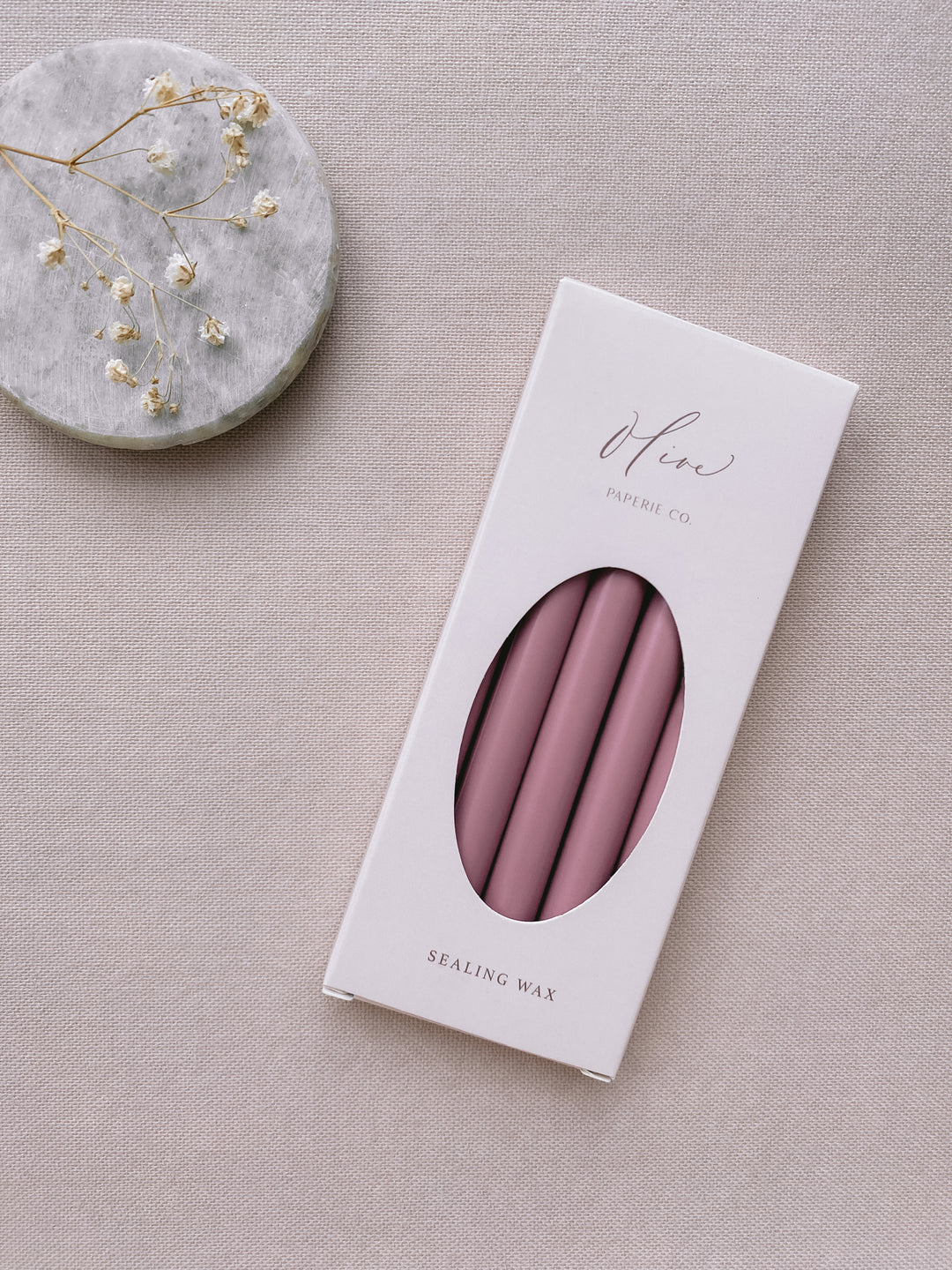 a box of 5 sealing wax sticks in mulberry dusty rose color_side angle