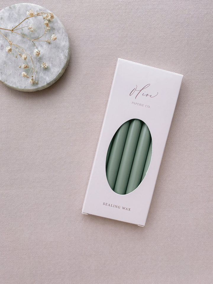 a box of 5 sage green sealing wax sticks_side angle