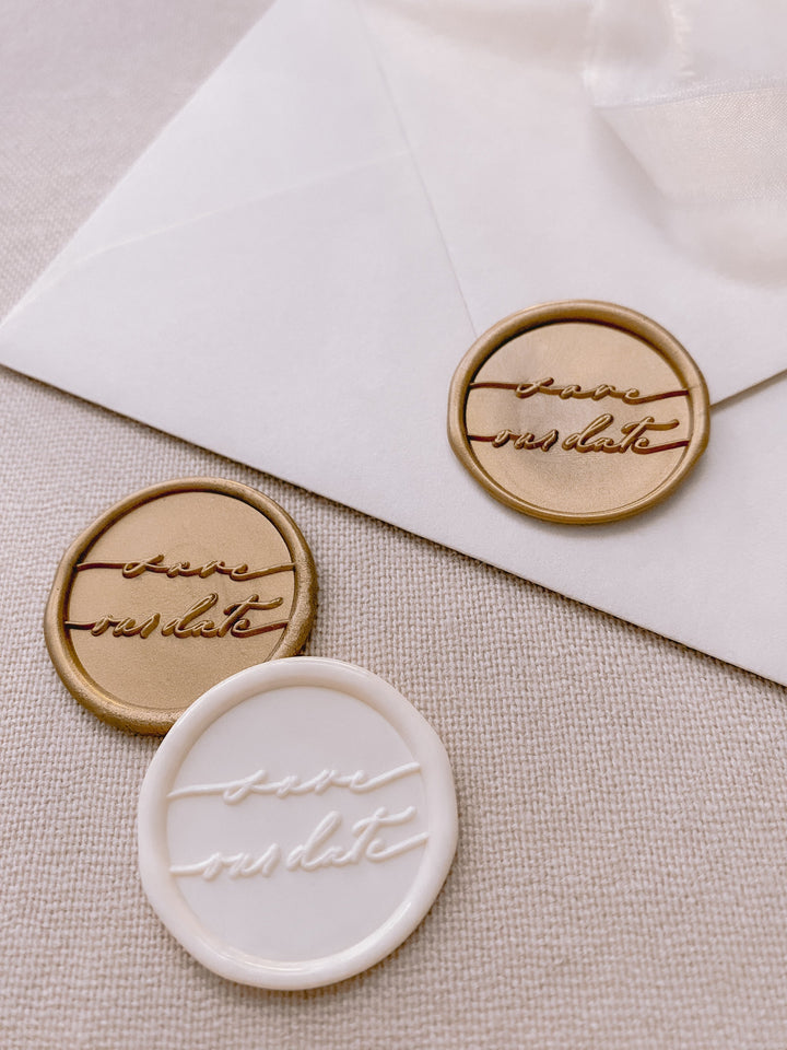 Gold and off-white save our date calligraphy script wax seals 