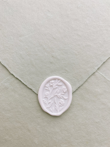 3D oval floral wax seal in white on sage handmade paper envelope