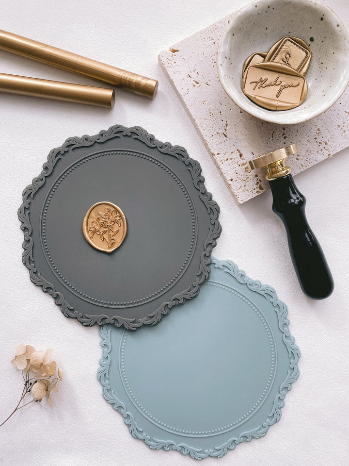 silicone mats in charcoal and pale blue