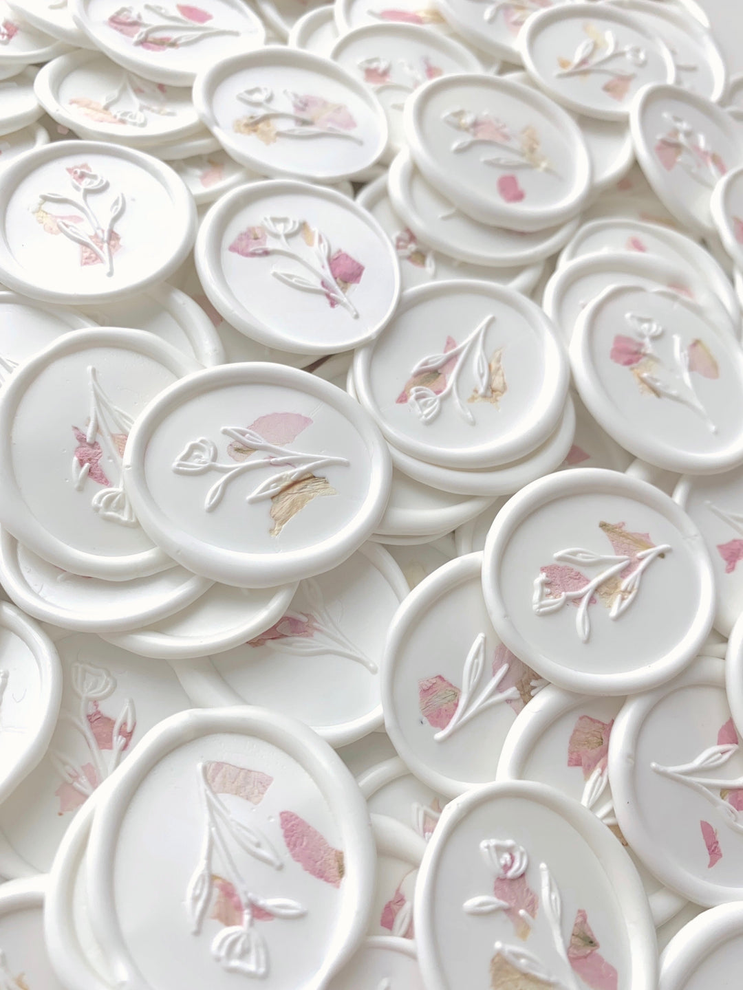 Simple flower oval wax seals in white with blush dried flower petals