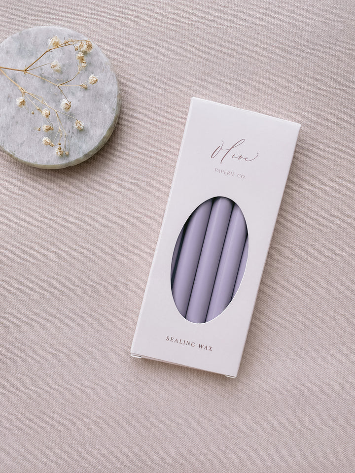 a box of 5 lavender colored sealing wax sticks_side angle