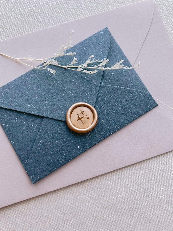 3D stars emoji gold wax seal on blue mini envelope