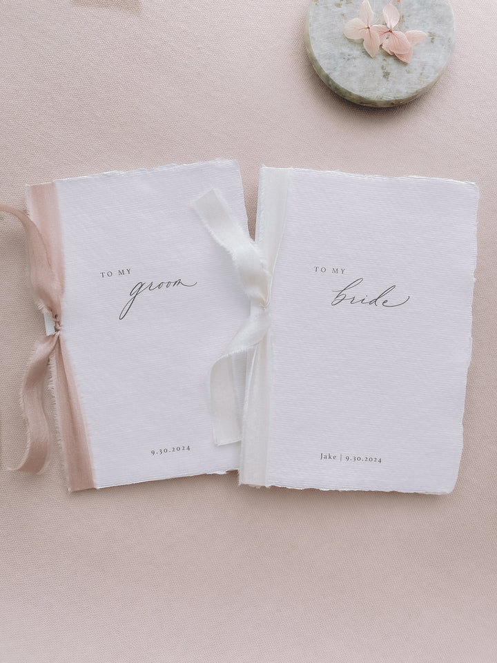 Set of two to my groom to my bride white wedding vow books tied in pink and off-white silk ribbons