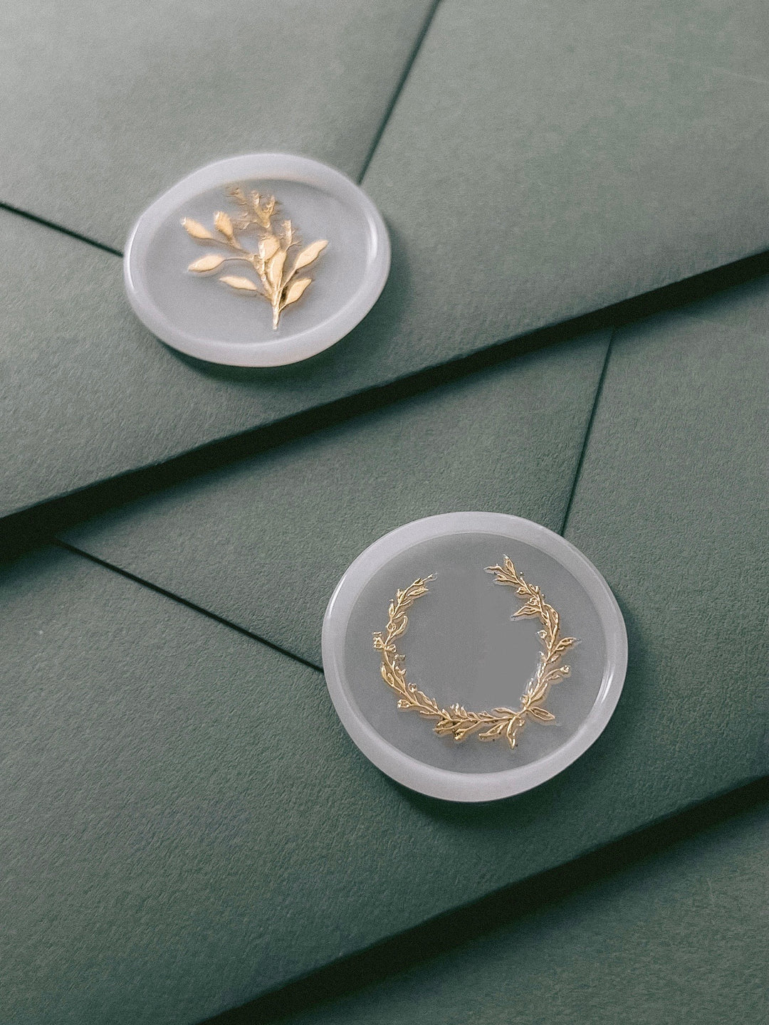 vellum wax seals of botanical deigns decorated with gold accent