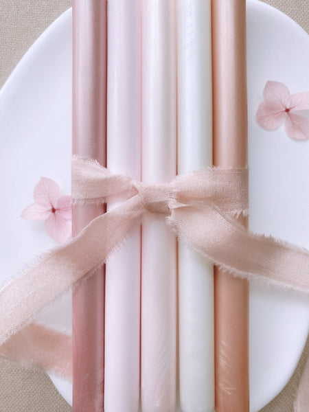 a set of 5 blush tones sealing wax sticks in rose gold, light blush, nude pearl, white pearl, coral colors _clseup front angle