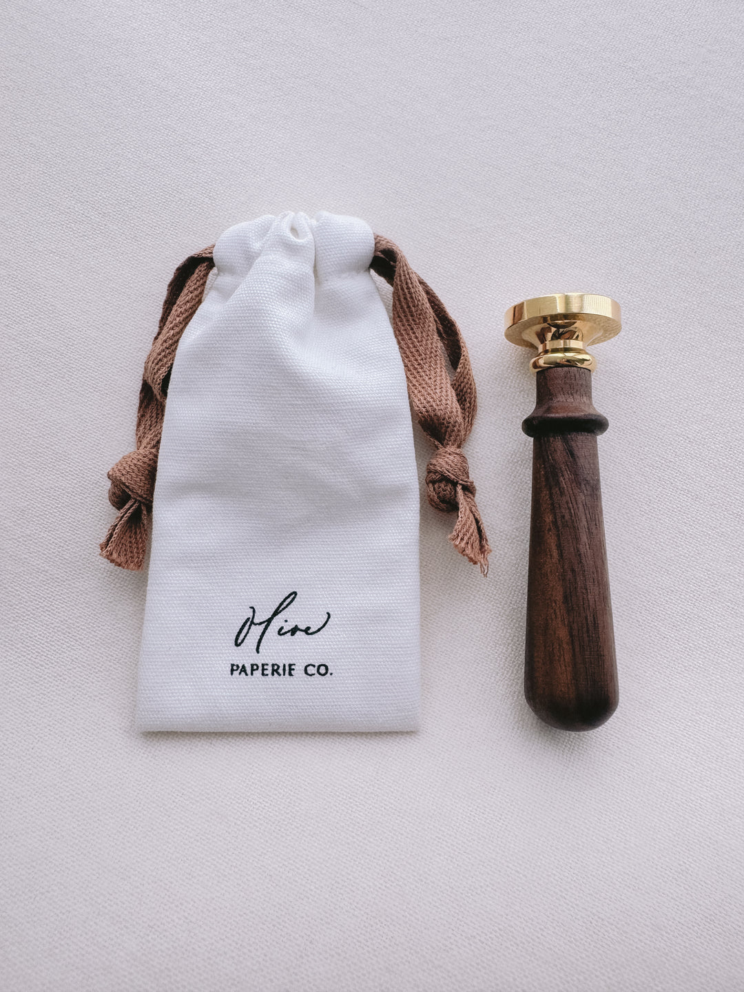 storage bag with brown drawstring  for wax stamp with handle