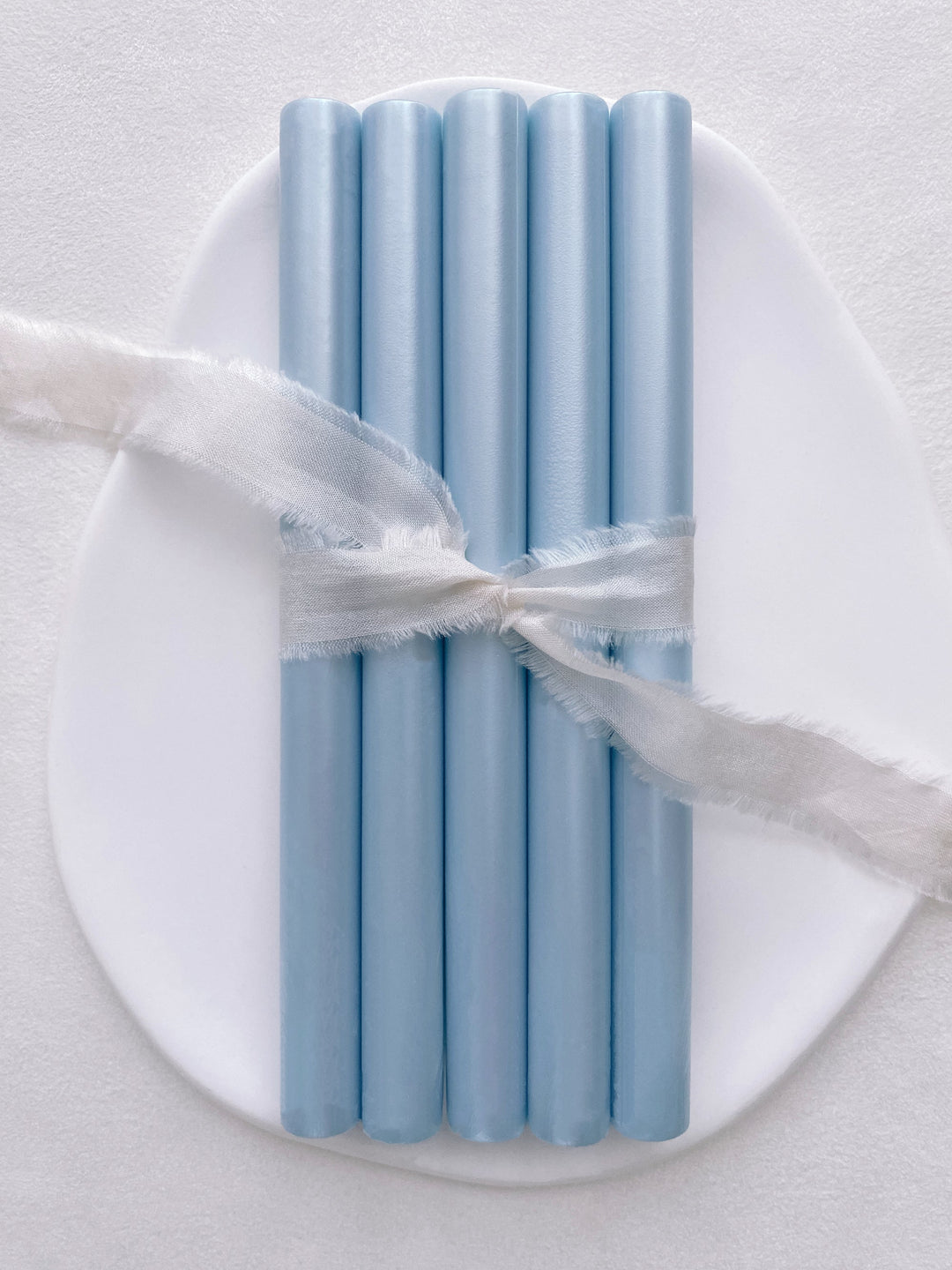 a set of 5 light blue color glue gun sealing wax sticks