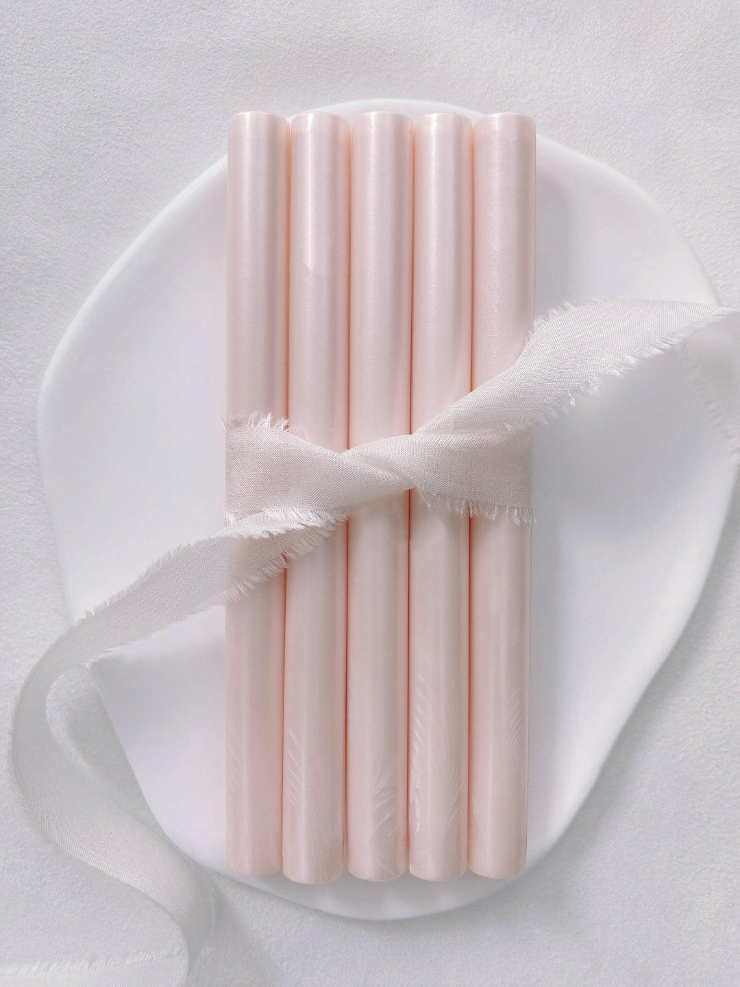 a set of 5 nude pearl glue gun sealing wax sticks