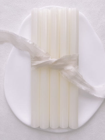 a set of 5 vellum sealing wax sticks